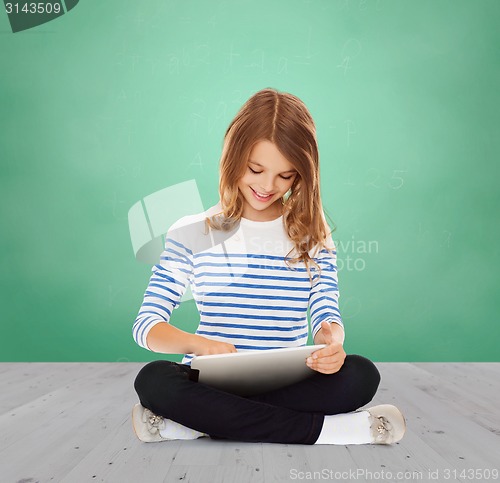 Image of happy little student girl with tablet pc