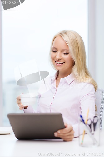 Image of smiling businesswoman or student with tablet pc