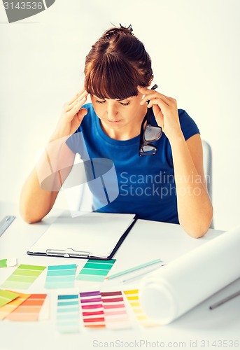 Image of stressed interior designer