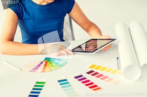 Image of woman working with color samples for selection