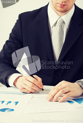 Image of man with contract