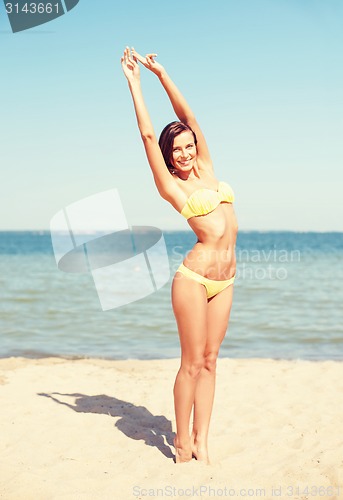 Image of girl posing on the beach