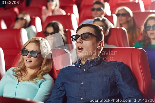 Image of friends watching horror movie in 3d theater