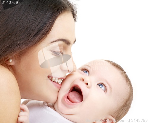 Image of mother kissing her baby