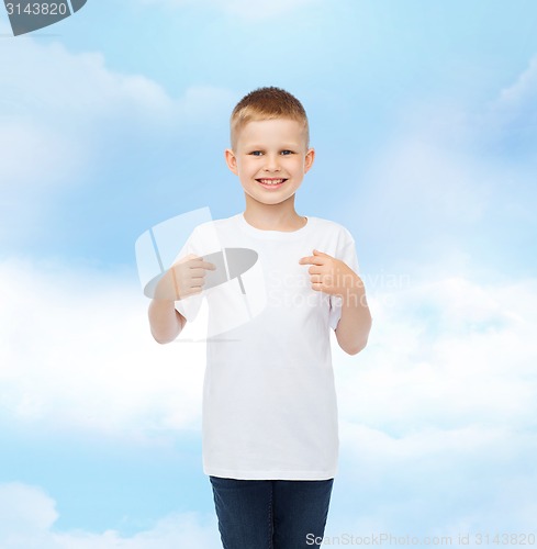 Image of smiling little boy in white blank t-shirt