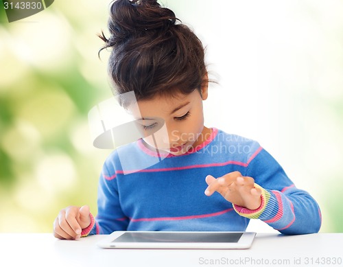 Image of little girl with tablet pc