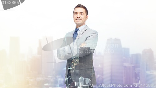 Image of happy smiling businessman in suit