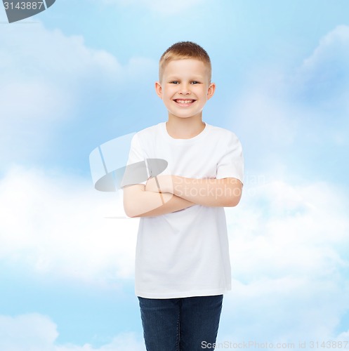 Image of smiling little boy in white blank t-shirt