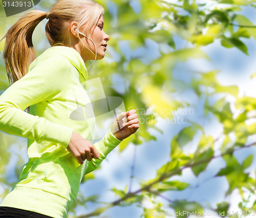 Image of woman jogging outdoors