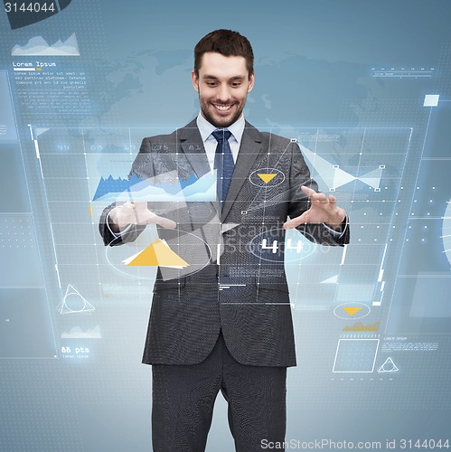 Image of businessman working with virtual screen