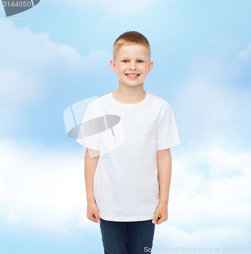 Image of smiling little boy in white blank t-shirt