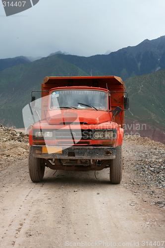 Image of Chinese truck driving in Tibet