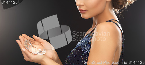 Image of woman with big diamond