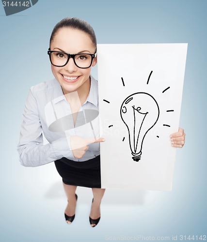 Image of smiling businesswoman with white board