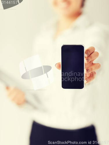 Image of woman hand with smartphone