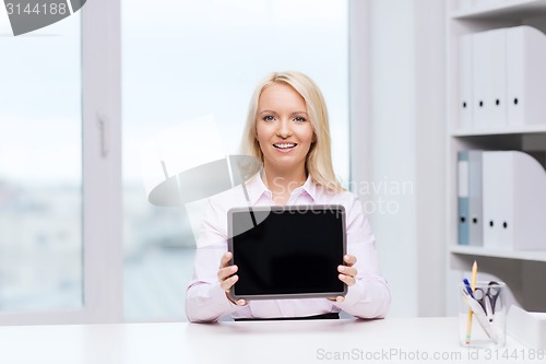 Image of smiling businesswoman or student with tablet pc