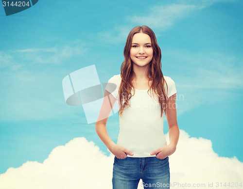 Image of smiling teenager in blank white t-shirt