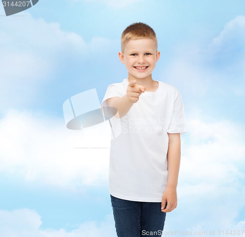 Image of smiling little boy in white blank t-shirt