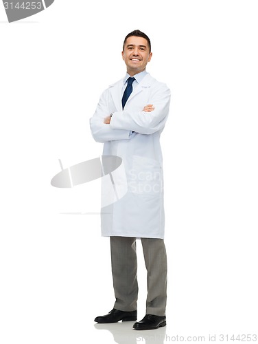 Image of smiling male doctor in white coat