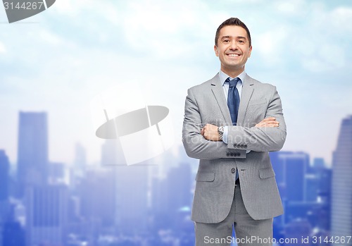 Image of happy smiling businessman in suit