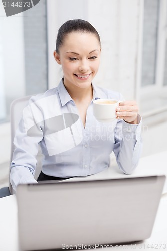 Image of smiling businesswoman or student with laptop
