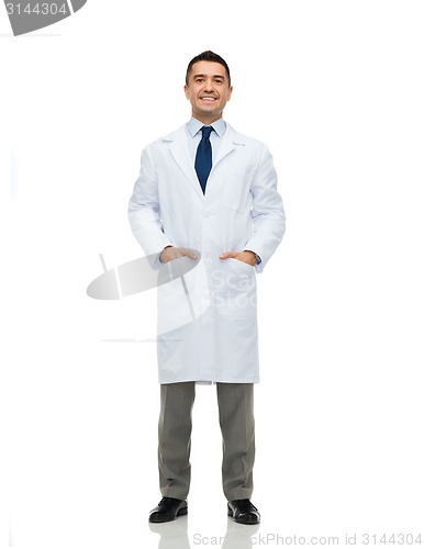 Image of smiling male doctor in white coat