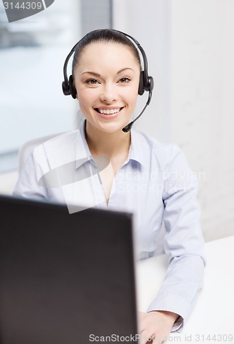 Image of friendly female helpline operator