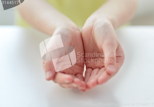 Image of close up of child cupped hands