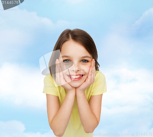 Image of smiling little girl over white background