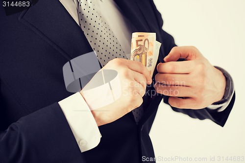 Image of man with euro cash money