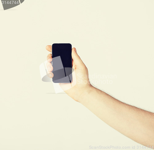 Image of man with smartphone