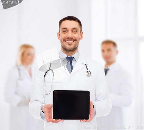 Image of smiling male doctor with tablet pc