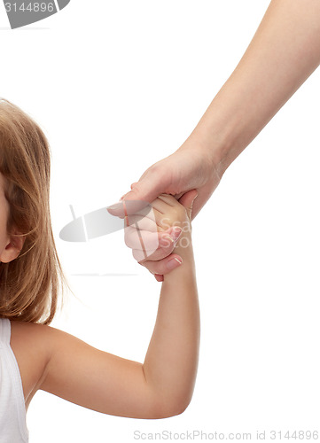 Image of close up of woman and little girl holding hands