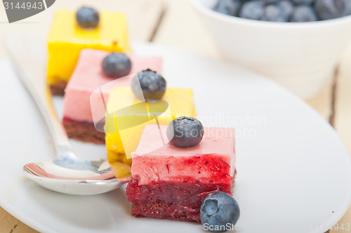 Image of strawberry and mango mousse dessert cake
