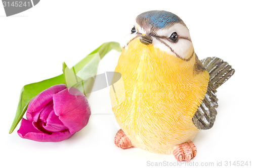 Image of Tulip with bird figurine