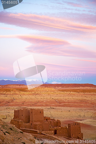 Image of hill  in   old contruction         and   brick wall