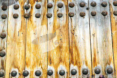 Image of brown  morocco in  rusty safe padlock 