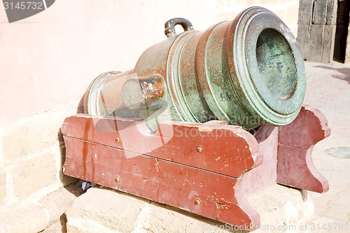 Image of in africa morocco  green bronze cannon and the blue sky