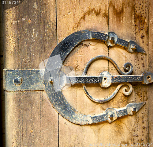 Image of rusty  brown    morocco in africa the old wood  facade home and 