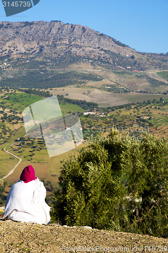 Image of from high in the woman  field and constructions