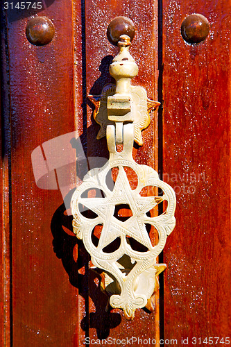Image of metal rusty  brown    morocco in africa gold  padlock 