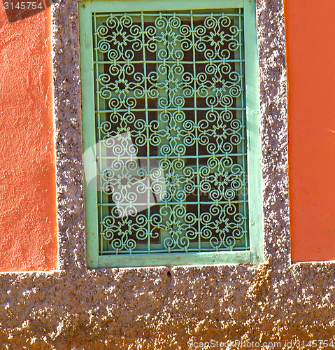 Image of  window in red  and old construction wal brick historical