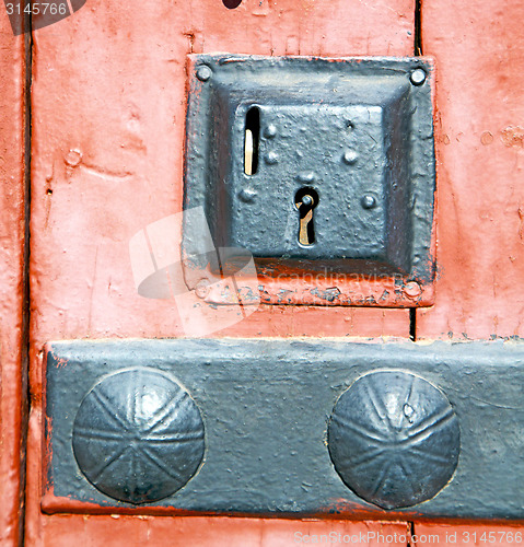 Image of rusty  brown    morocco in africa the red  safe padlock 