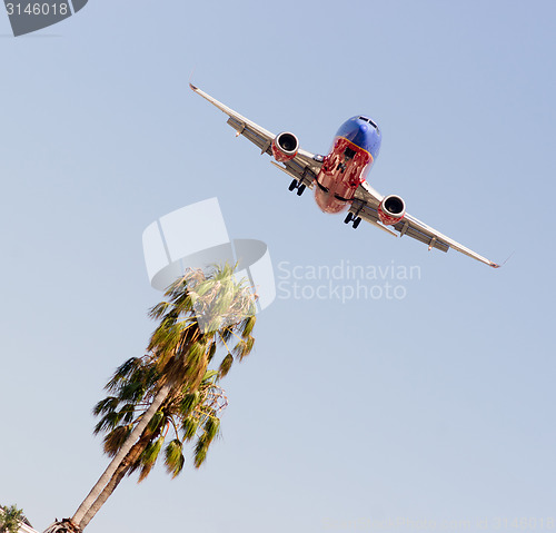 Image of Jet Aiplane Domestic Airline Flight Descends for Landing