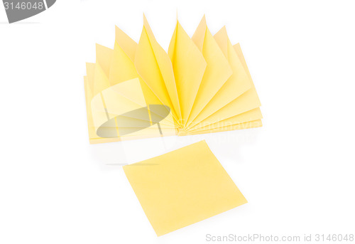 Image of Blank yellow sticky note and block on white