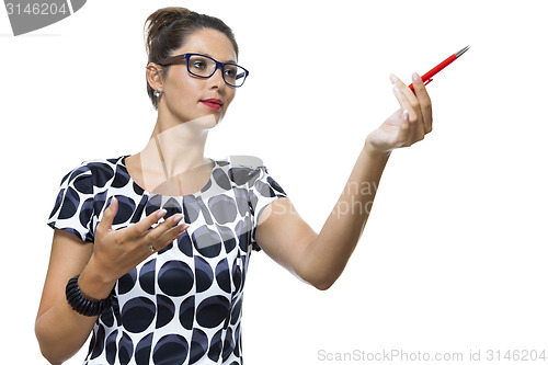 Image of Serious Woman in a Dress Holding Ballpoint Pen