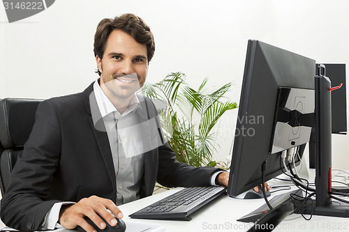 Image of Stylish businessman chatting on the phone