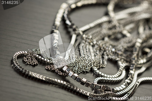 Image of Pile of assorted silver chains