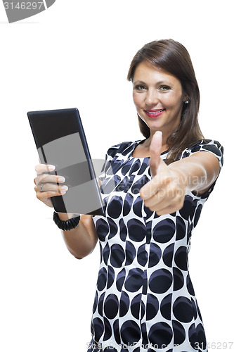 Image of Smiling Woman in a Dress Holding a Tablet Computer