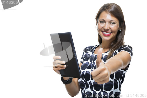 Image of Smiling Woman in a Dress Holding a Tablet Computer